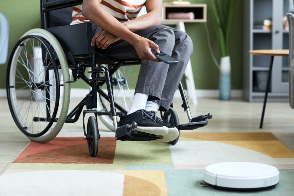 Man with Disability using Smart Vacuum Cleaner